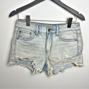American eagle Tomgirl Shortie shorts light wash Size 2 Raw Hem high rise